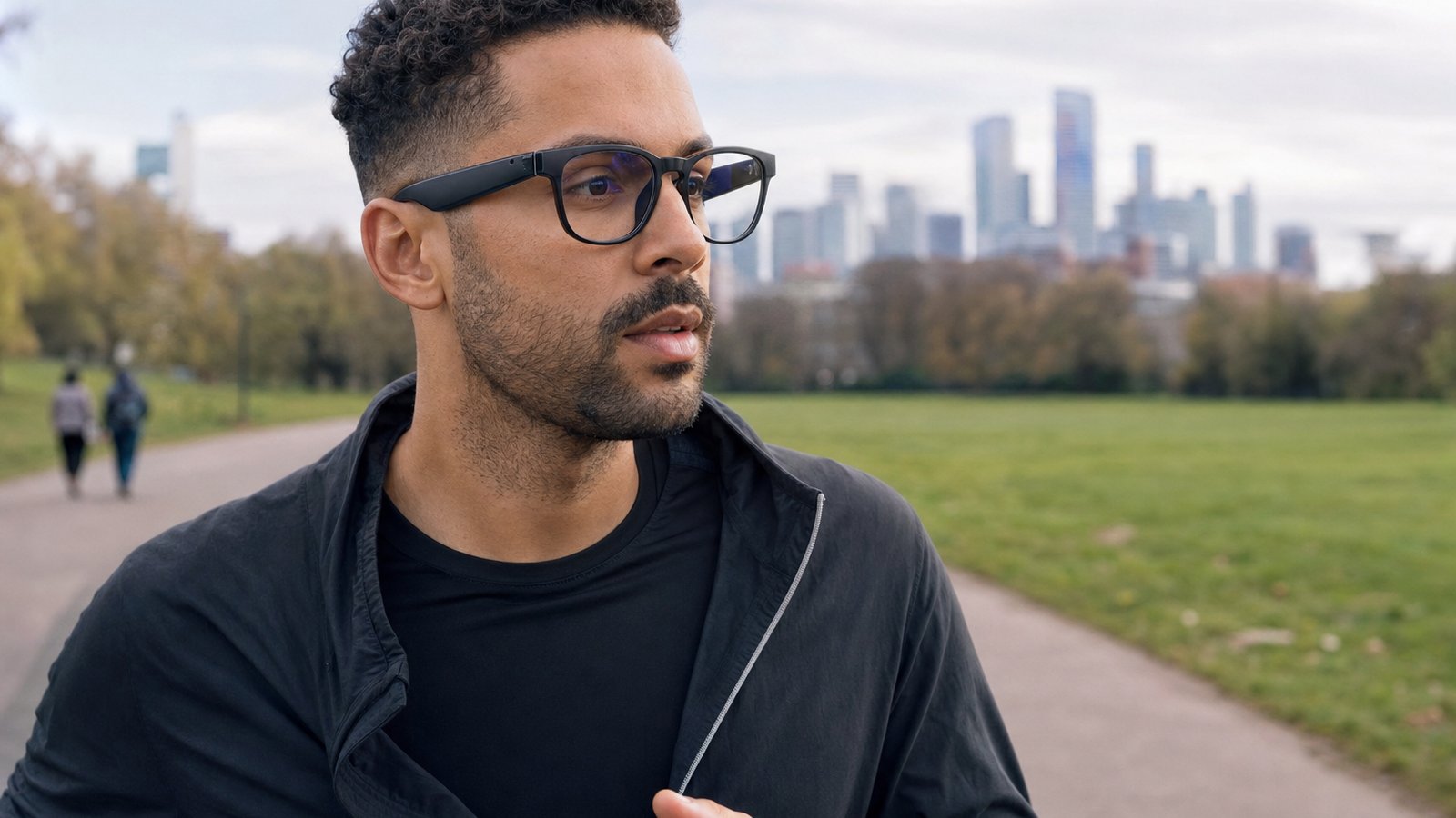 Black open-ear smart glasses worn for a UK park run